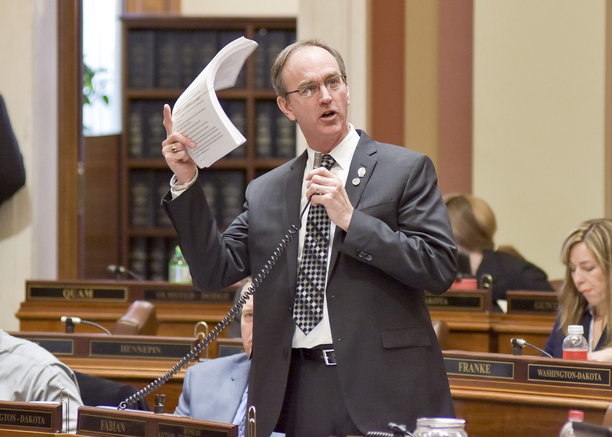 Rep. Dan Fabian presents the omnibus environment and natural resources bill on the House Floor March 30. Photo by Andrew VonBank